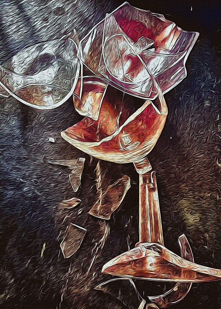 A broken wine glass with sunlight streaming through, symbolising breaking free from addiction. Sobriety vs. Recovery: The Truth About Healing and Moving Forward